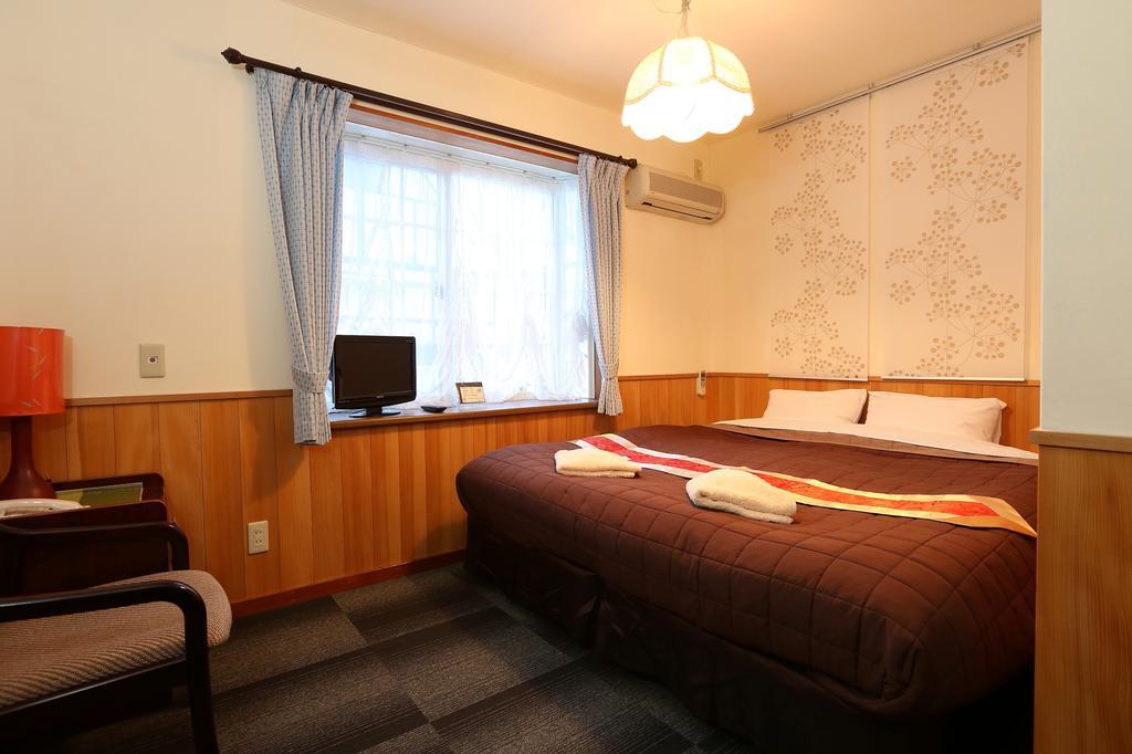Bed and Breakfast Alpine Wind Хакуба Номер фото
