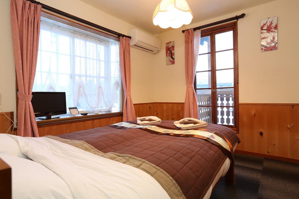 Bed and Breakfast Alpine Wind Хакуба Номер фото