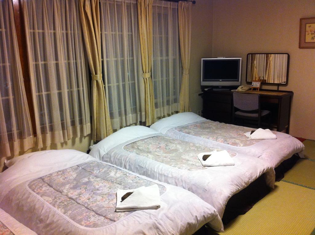 Bed and Breakfast Alpine Wind Хакуба Екстер'єр фото